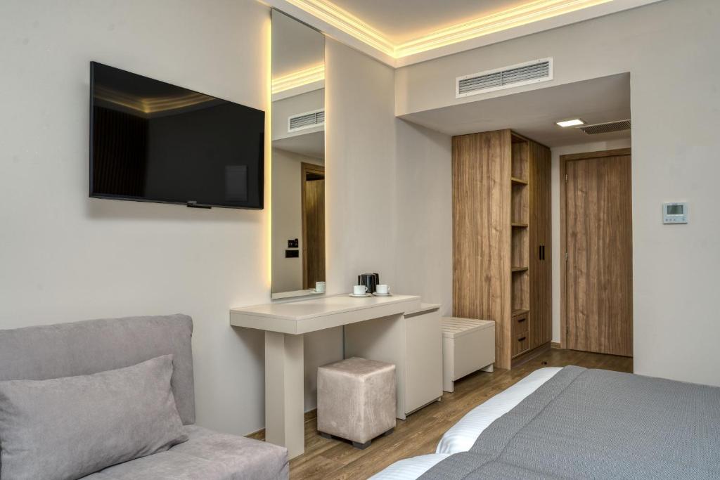 TV a/nebo společenská místnost v ubytování Palatino Hotel