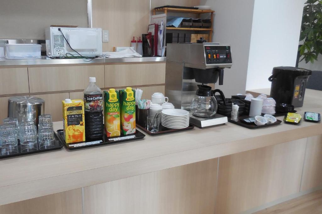 Příslušenství pro přípravu čaje a kávy v ubytování Hotel Ohedo