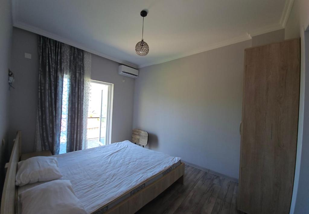Postel nebo postele na pokoji v ubytování Guest House Tekla