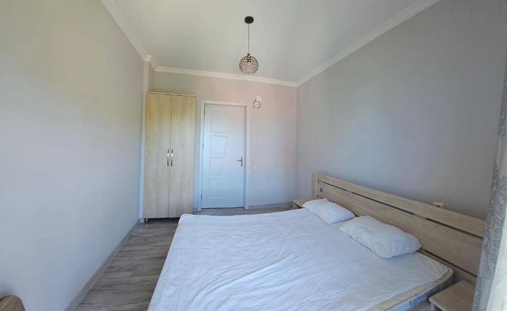 Postel nebo postele na pokoji v ubytování Guest House Tekla