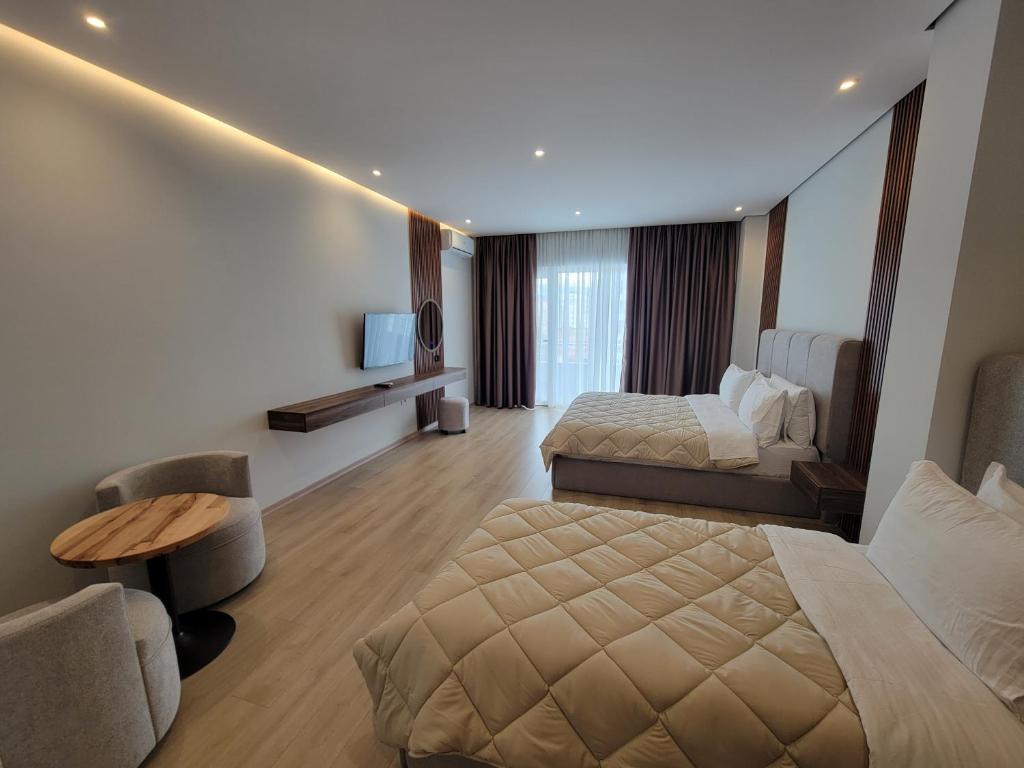 Voodi või voodid majutusasutuse Hotel Enkelana toas