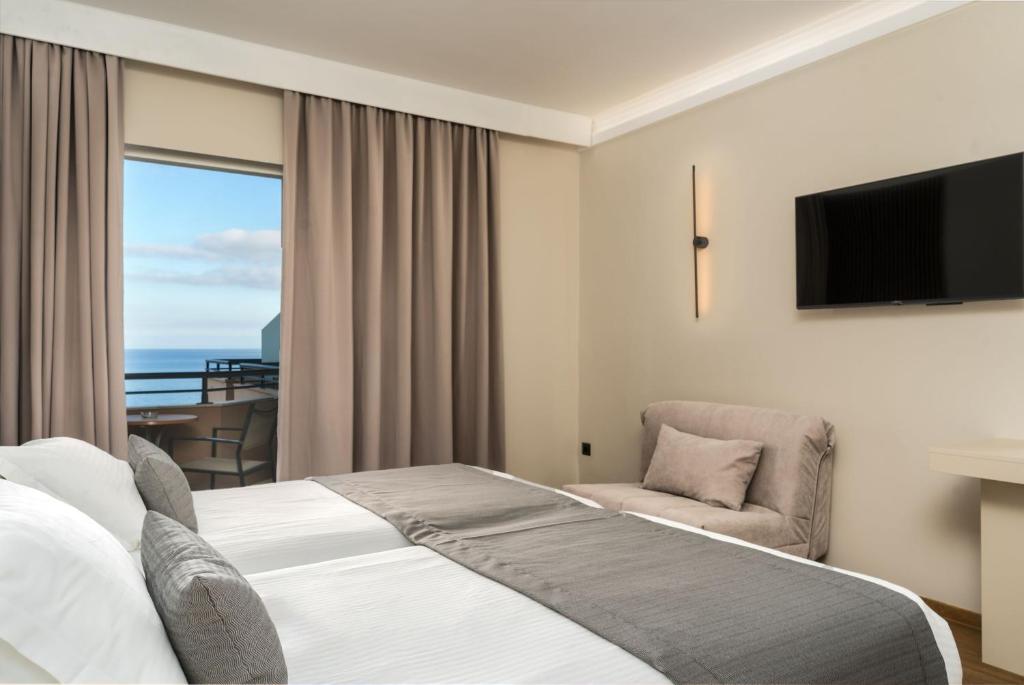 Postel nebo postele na pokoji v ubytování Palatino Hotel