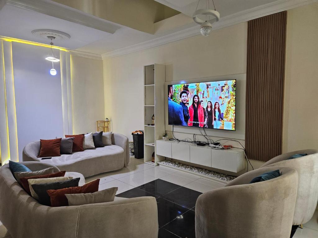 TV a/nebo společenská místnost v ubytování Tony Kams