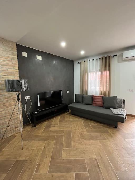 a living room with a couch and a fireplace at 3-Bedroom Home, Free Parking,10 Minutes from Seville in Camas