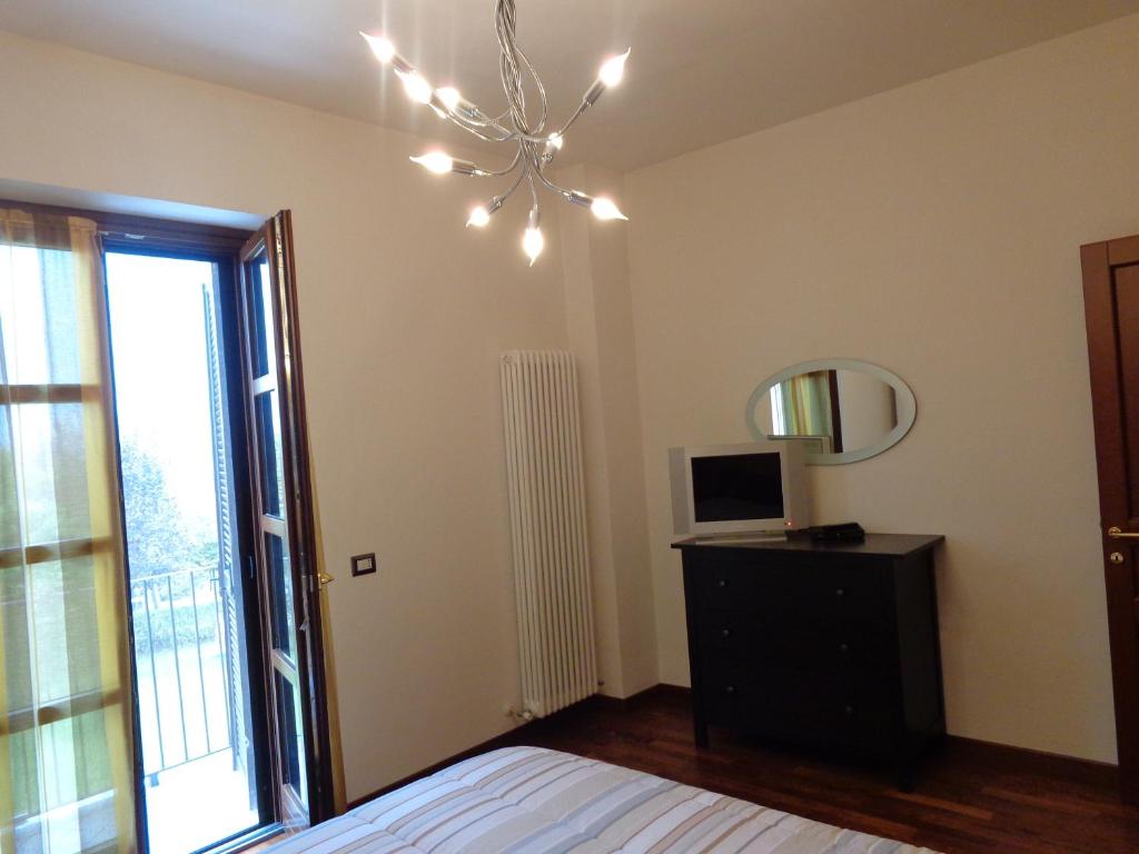Postel nebo postele na pokoji v ubytování La Casa in Rivalta