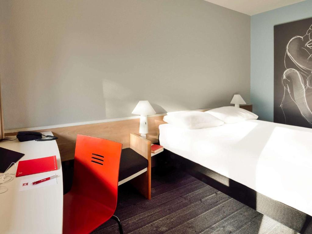 Postel nebo postele na pokoji v ubytování Ibis Budapest Citysouth
