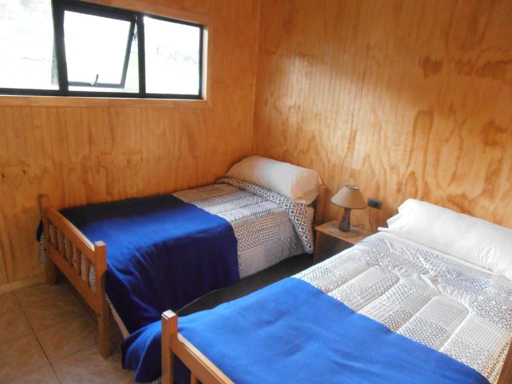 Postel nebo postele na pokoji v ubytování Agroturismo Coñico