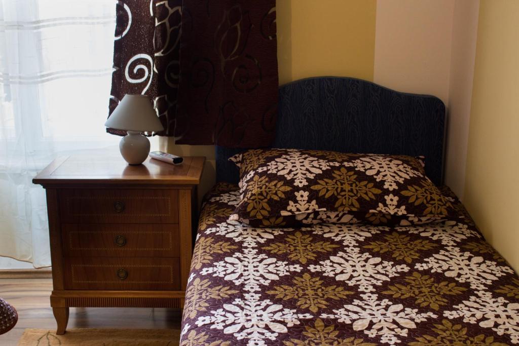 Postel nebo postele na pokoji v ubytování Rooms Cristal Roche