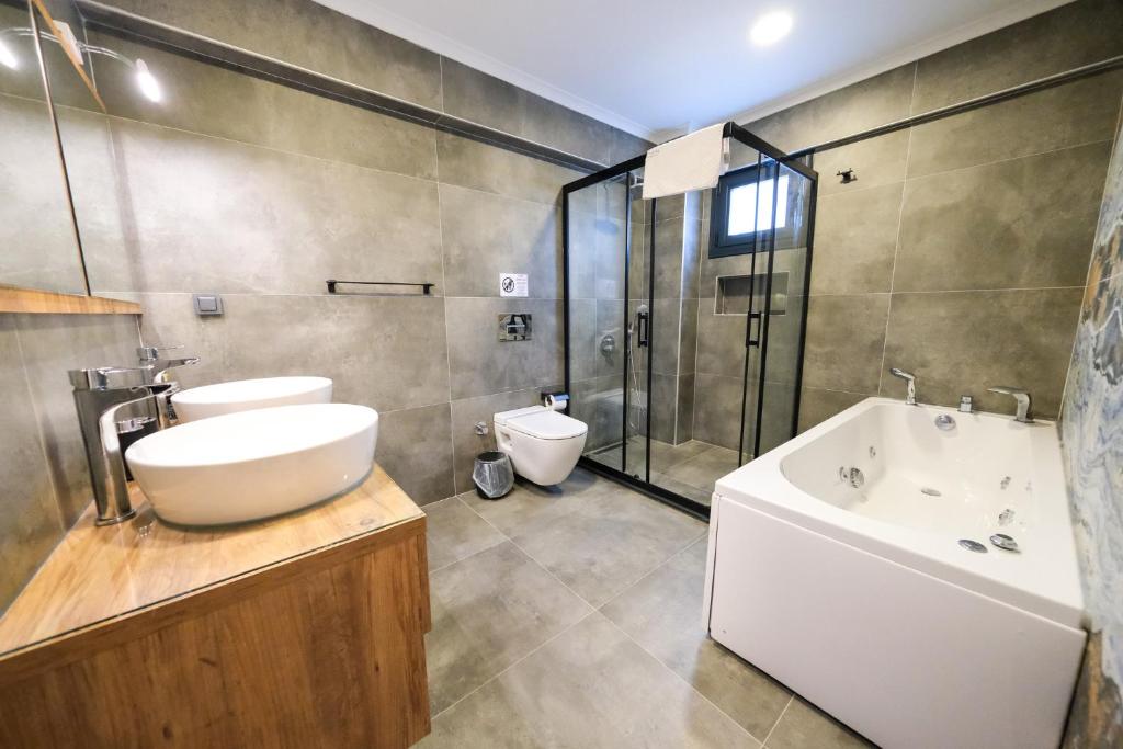 A bathroom at Olive Hills Villa - Family-Friendly Luxury Villa Yesiluzumlu Fethiye by Sunworld Villas