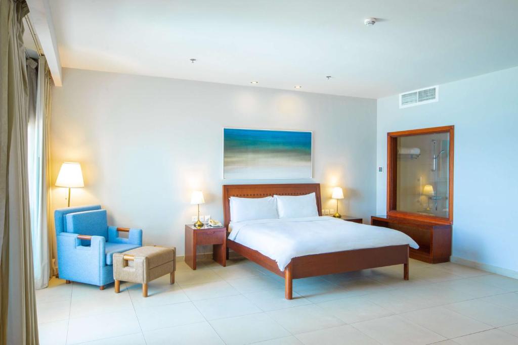 Tempat tidur dalam kamar di Radisson Blu Resort, Fujairah