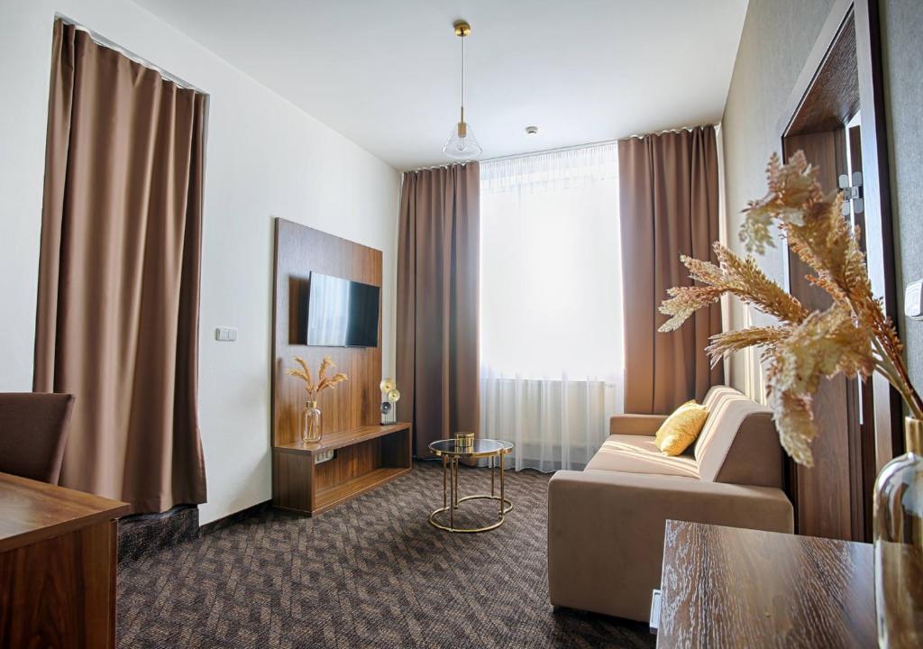 TV a/nebo společenská místnost v ubytování Hotel Magnólia