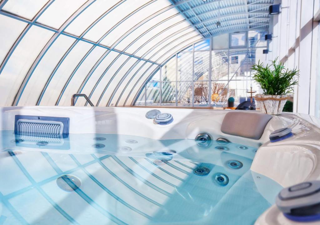 Bazén v ubytování Hotel Magnólia nebo v jeho okolí