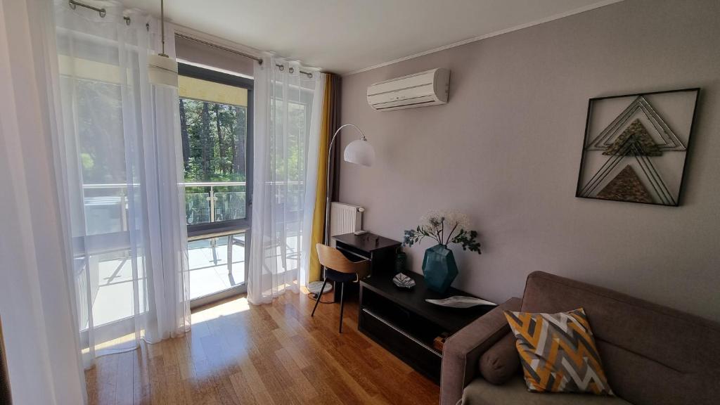 Posedenie v ubytovaní Apartament w Willi Woda w Juracie