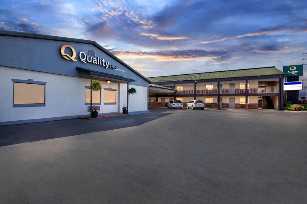 an empty parking lot in front of a hotel at Quality Inn in Lawrenceburg