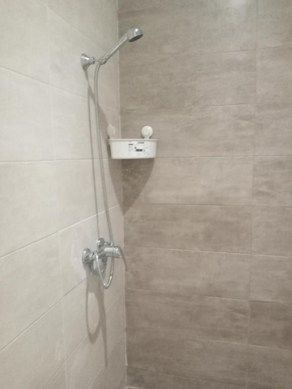 Ένα μπάνιο στο Appartement avec piscine et accès à la plage