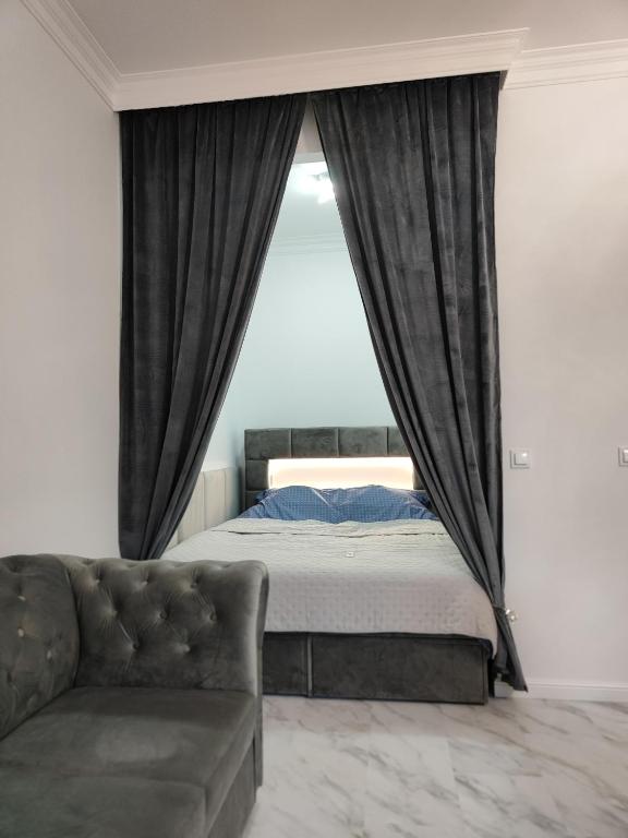 Postel nebo postele na pokoji v ubytování Apartament Jak w banku