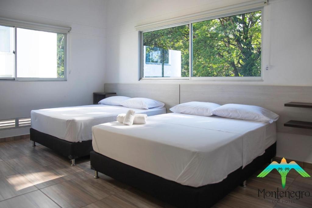 Postel nebo postele na pokoji v ubytování Ecohotel Montenegro