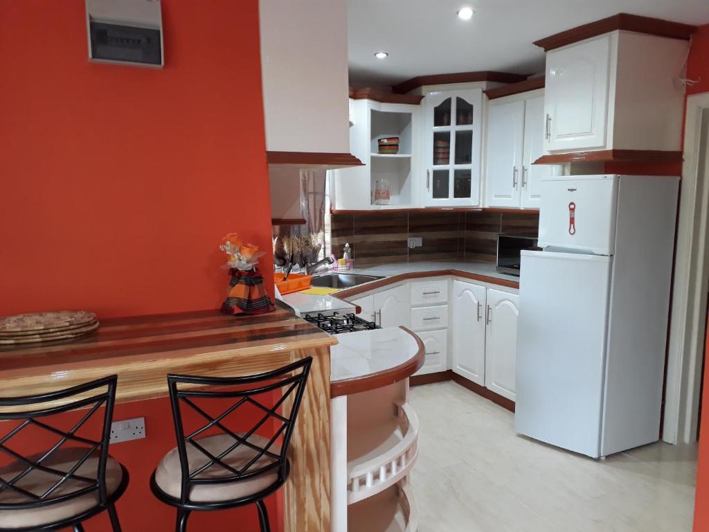 Kuchyň nebo kuchyňský kout v ubytování Argalo Suites 1