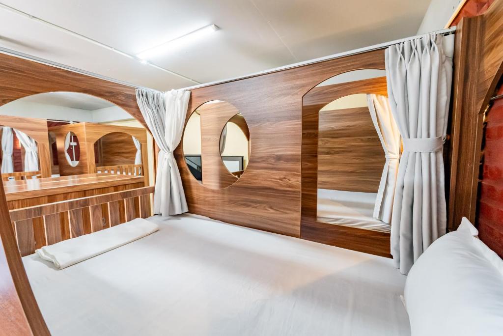 Voodi või voodid majutusasutuse Soleil Hostel toas