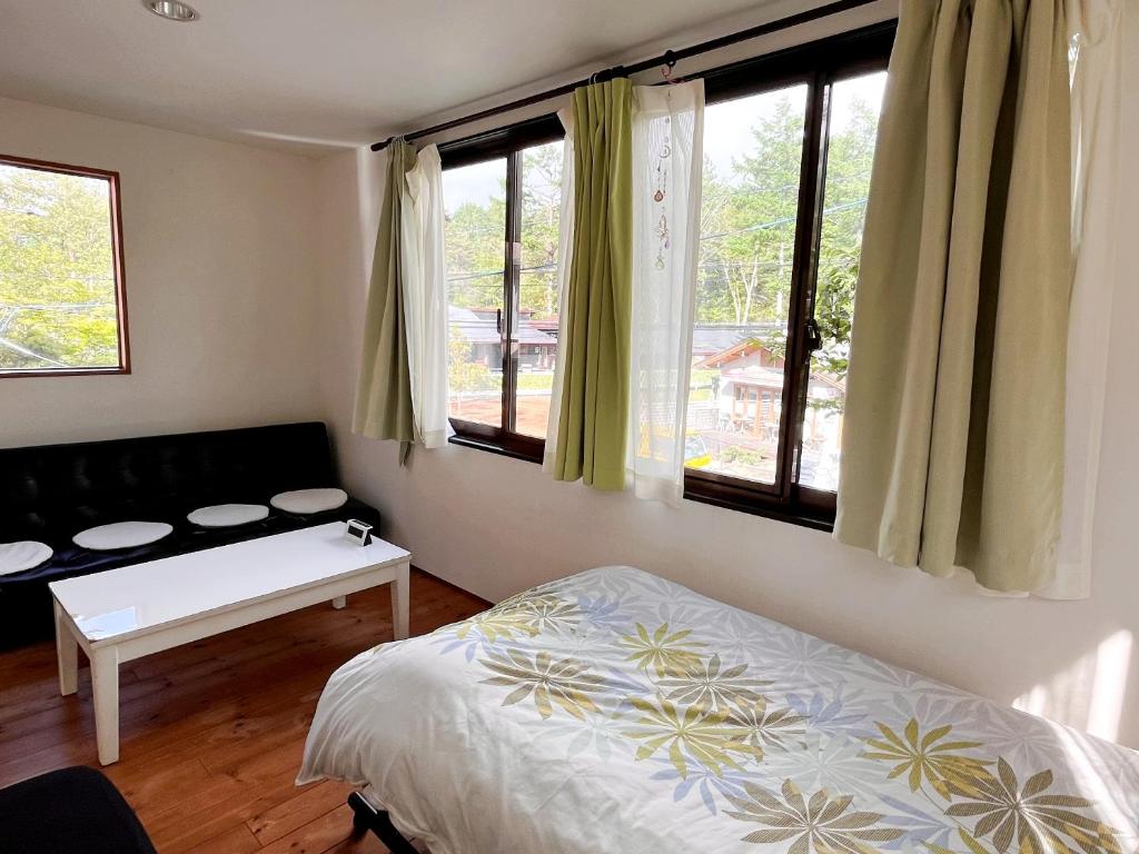 Postel nebo postele na pokoji v ubytování Casa Allegra