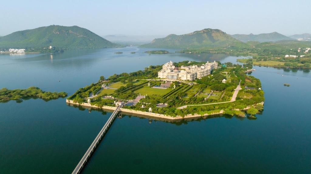 an island in the middle of a large body of water at Raffles Udaipur in Udaipur