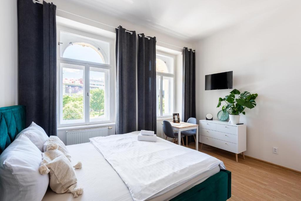 Postel nebo postele na pokoji v ubytování Residence Tesnov Apartment