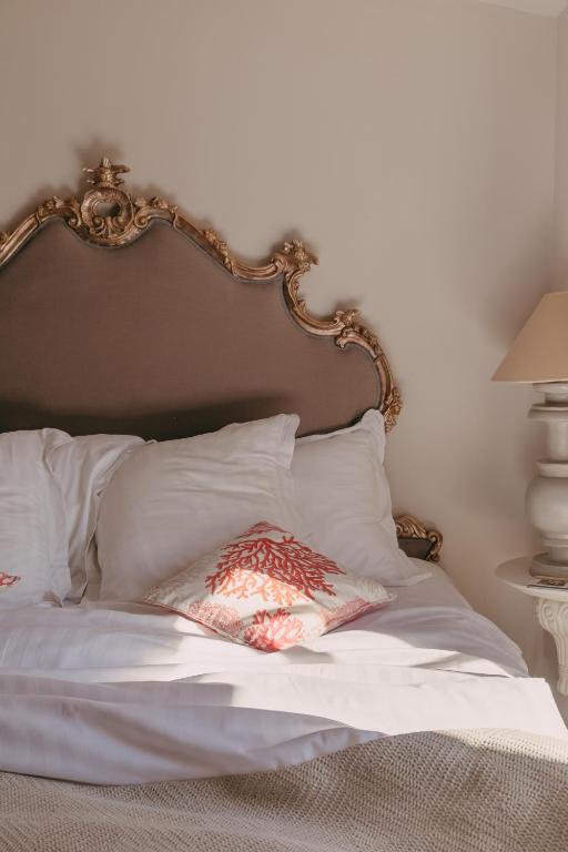 Кровать или кровати в номере Hôtel Villa Marie Saint Tropez