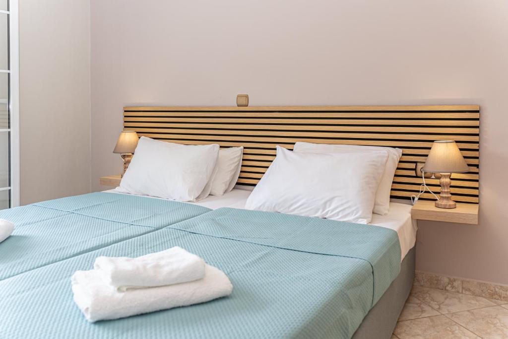 Postel nebo postele na pokoji v ubytování Arte villa Margarita apartment