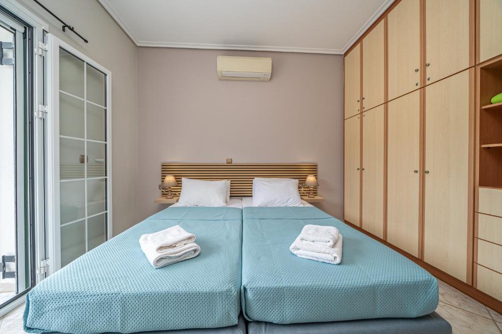 Postel nebo postele na pokoji v ubytování Arte villa Margarita apartment