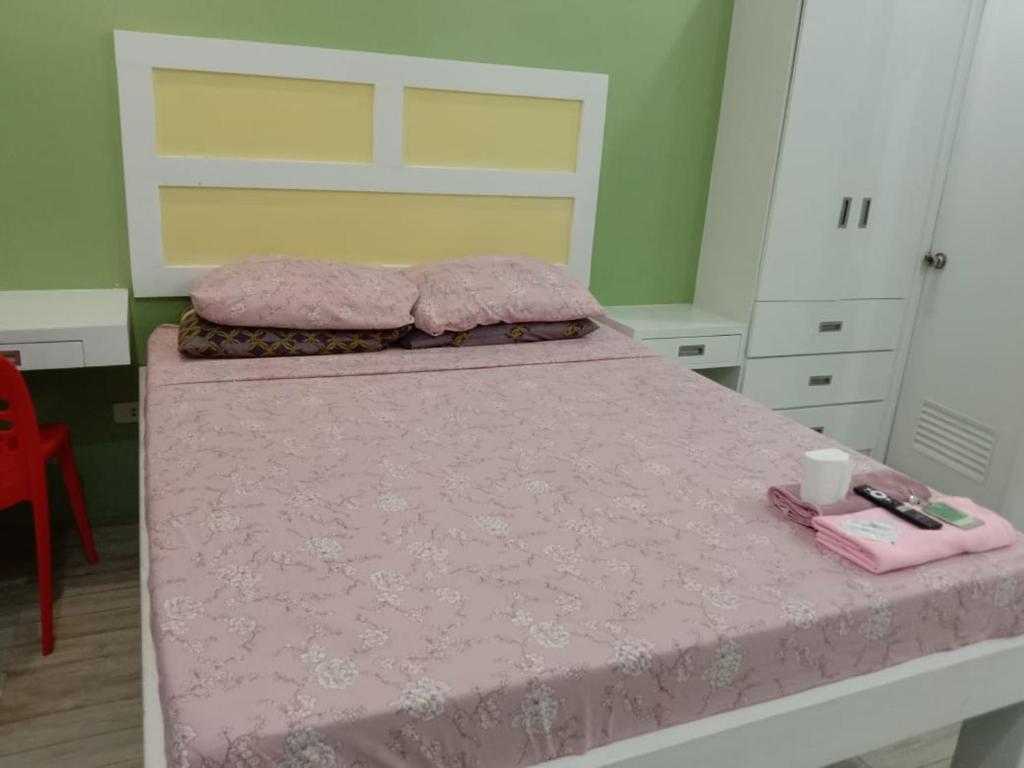 Postel nebo postele na pokoji v ubytování Enamorado Studios