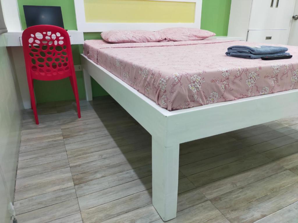 Postel nebo postele na pokoji v ubytování Enamorado Studios
