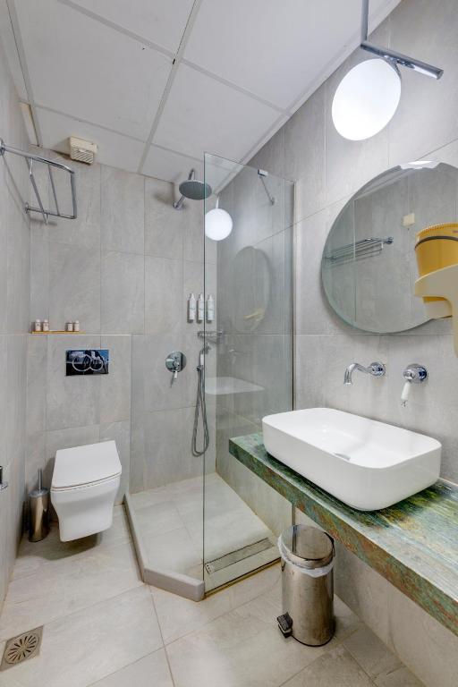Ванная комната в Electra Syros - Adults Only