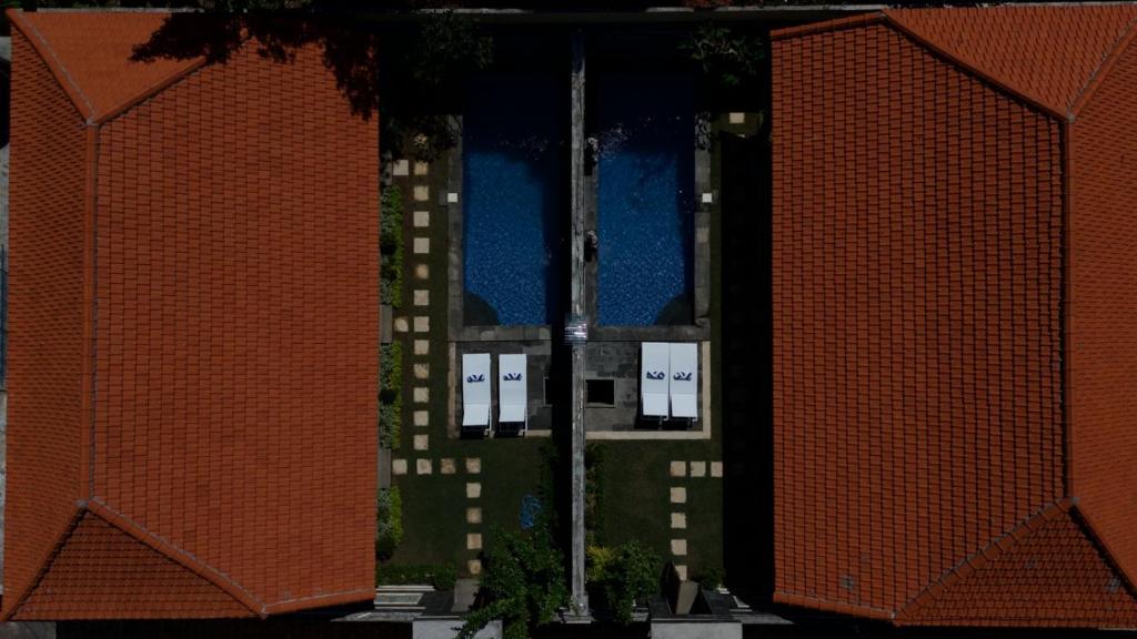 an aerial view of a building with two buildings at Anugerah Villa 3 in Amed