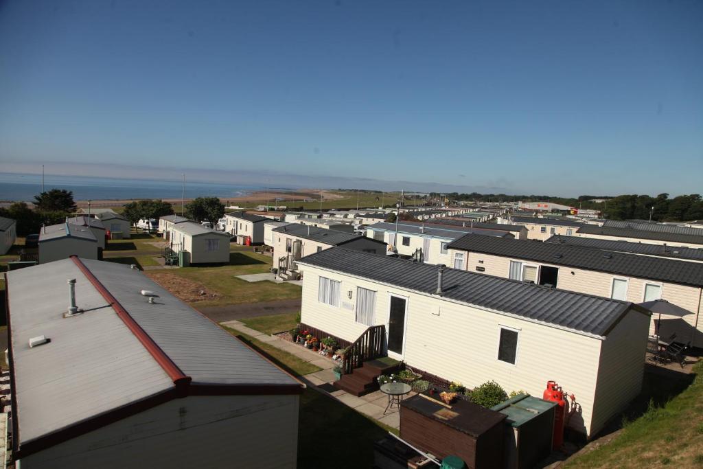 an aerial view of a row of houses at Red Lion Holiday Park in Arbroath