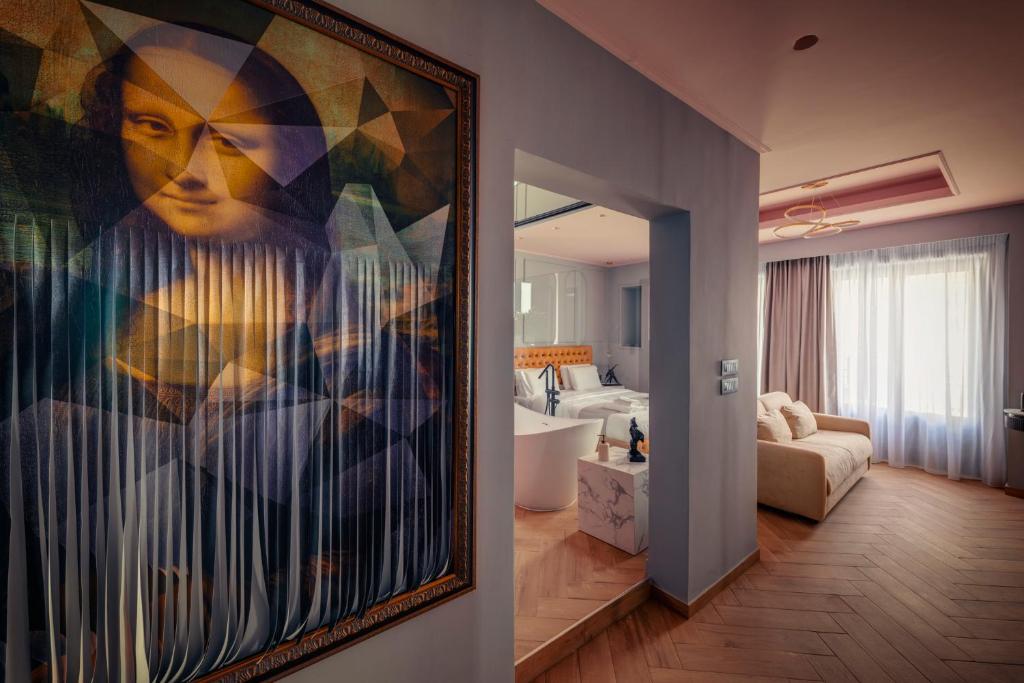 Postel nebo postele na pokoji v ubytování Ninemian Suites Syros