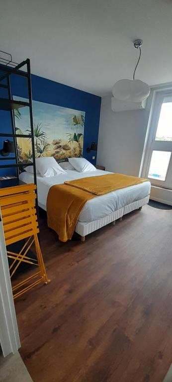 Postel nebo postele na pokoji v ubytování Hotel de Champagne