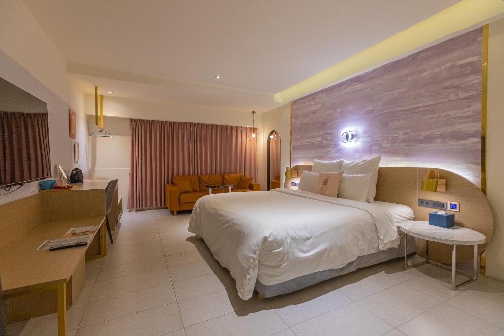 Postel nebo postele na pokoji v ubytování 里萊行旅 - Lilai Motel