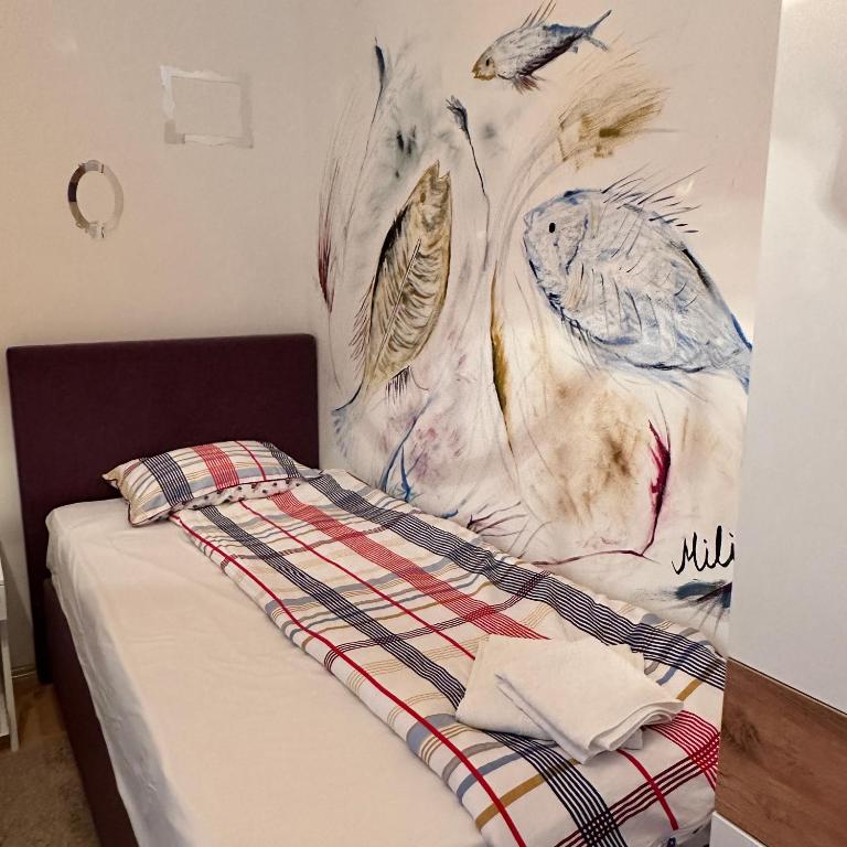 Postel nebo postele na pokoji v ubytování Apartments Lungo Mare