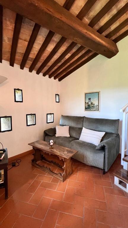 Łóżko lub łóżka w pokoju w obiekcie Agriturismo Podere Cortilla