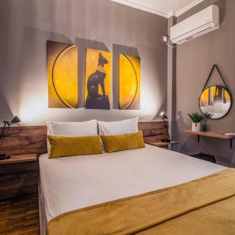 A bed or beds in a room at Classy Apartment in Athens