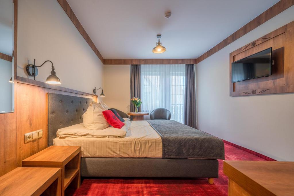 Postel nebo postele na pokoji v ubytování Magnolia
