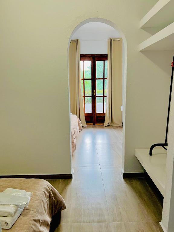 Postel nebo postele na pokoji v ubytování Hotel Paradise Ouranoupolis