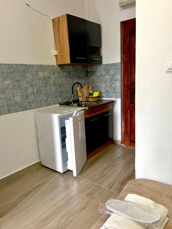 Kuchyň nebo kuchyňský kout v ubytování Hotel Paradise Ouranoupolis