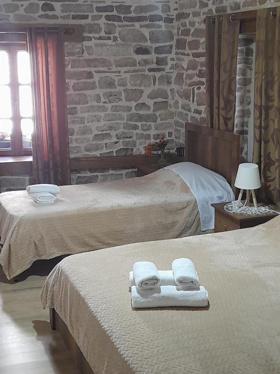 Postel nebo postele na pokoji v ubytování Guest House Ani