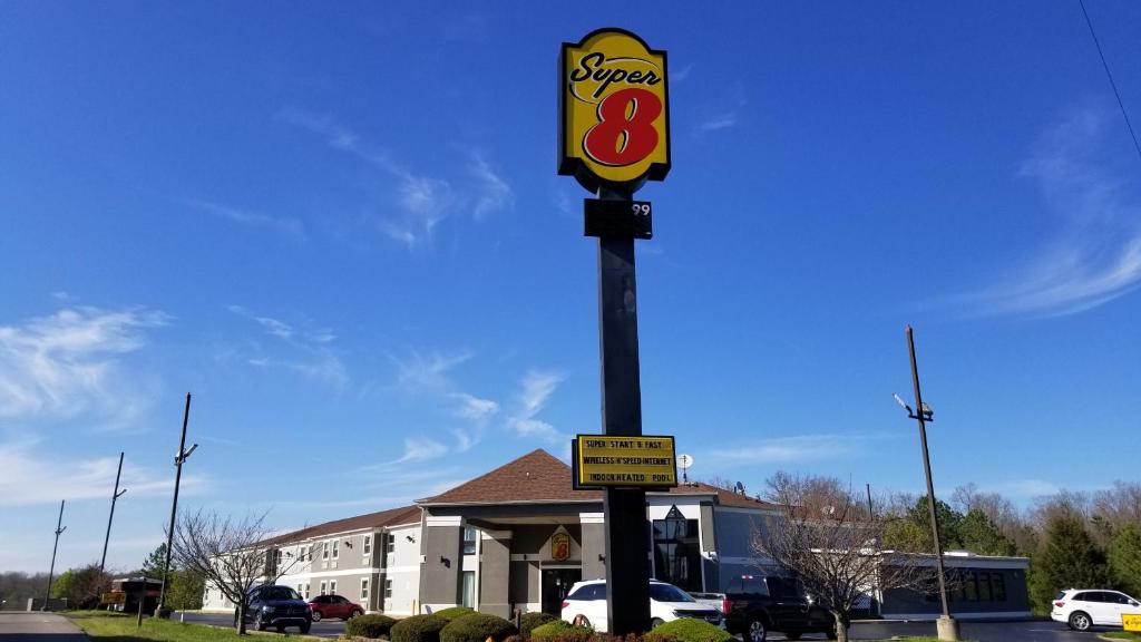 a sign in front of a fast food restaurant at Super 8 by Wyndham Dickson in Dickson