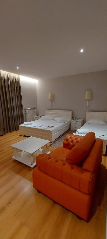 Postel nebo postele na pokoji v ubytování Hotel SHahini