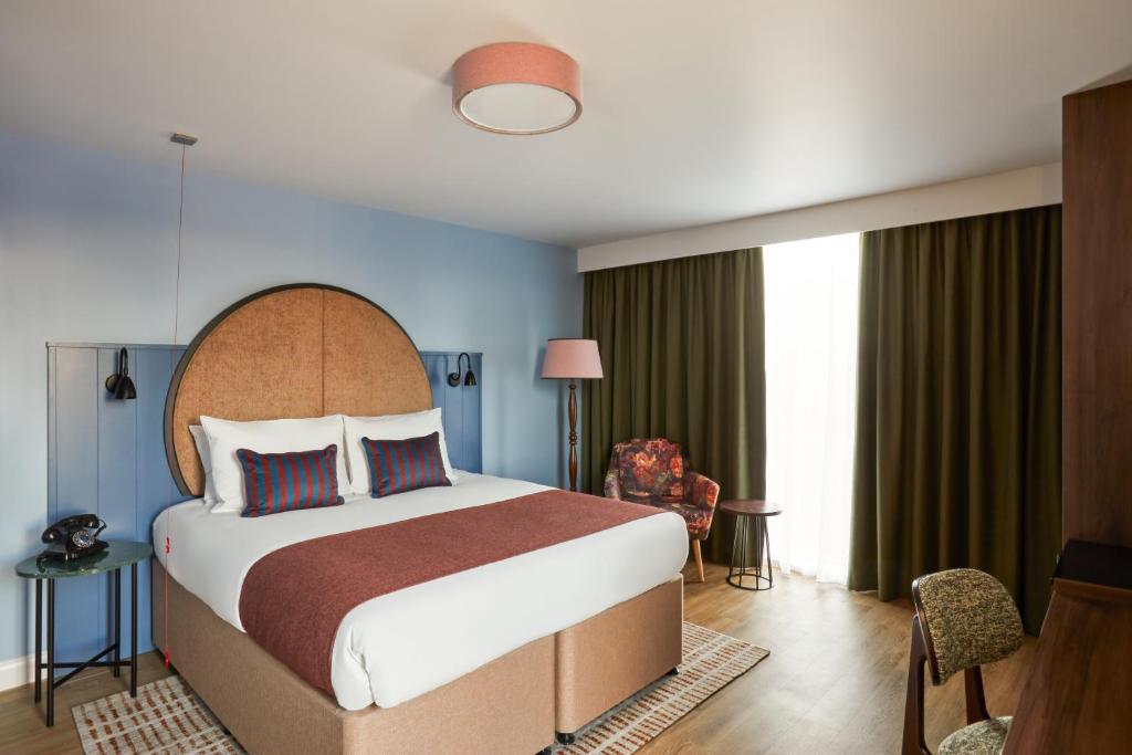 Postel nebo postele na pokoji v ubytování Hotel Indigo Coventry by IHG