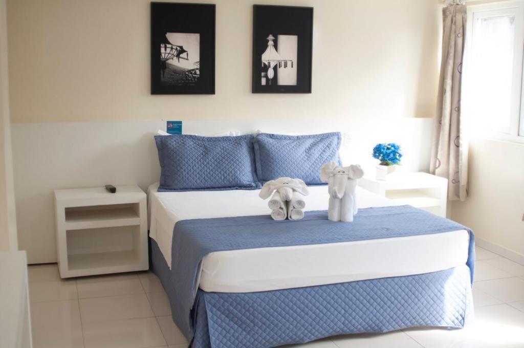 Krevet ili kreveti u jedinici u objektu Hotel Portinari Ponte da Amizade