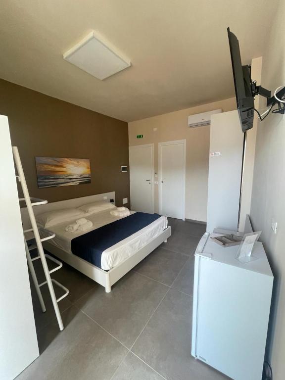 Postel nebo postele na pokoji v ubytování L'Isola Felice Favignana