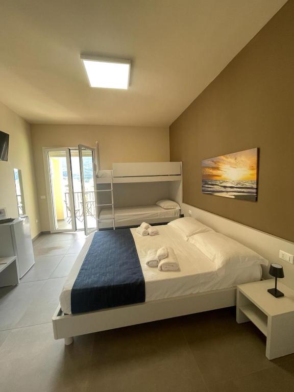 Postel nebo postele na pokoji v ubytování L'Isola Felice Favignana